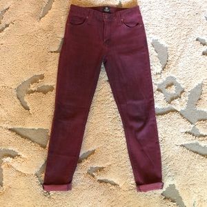 2 pairs of just black hemmed jeans